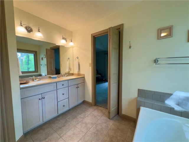 788 Latonka Dr, Coolspring Twp, PA 16137 - bathroom featuring double vanity, a bath, baseboards, and tile patterned flooring