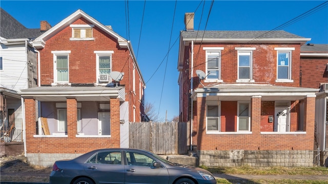 215 Radcliffe St, Esplen, PA 15204 - view of front of property featuring brick siding, fence, and a shingled roof