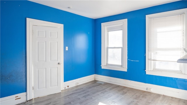 215 Radcliffe St, Esplen, PA 15204 - spare room with visible vents, baseboards, and wood finished floors