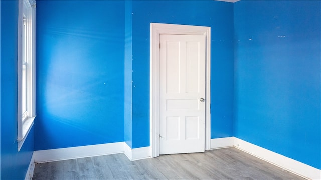 215 Radcliffe St, Esplen, PA 15204 - empty room featuring wood finished floors and baseboards
