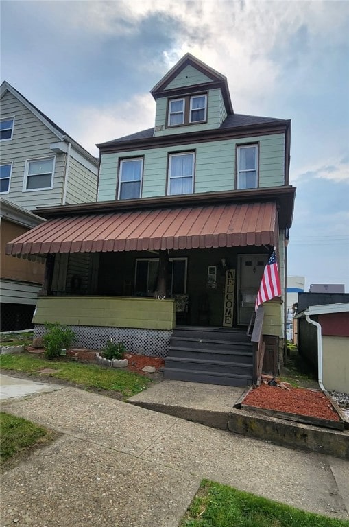 102 Sumner Ave, Vandergrift Wml, PA 15690 - view of front facade featuring covered porch