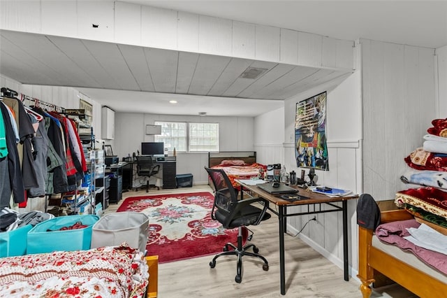 home office with light wood-type flooring