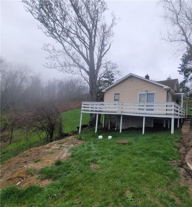 11 Murner Ln, Claysville, PA 15323 - exterior space with a deck and a lawn
