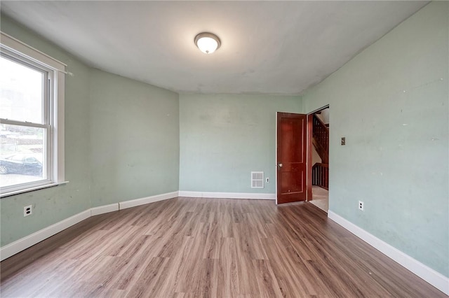 1223 Chelton Ave, Brookline, PA 15226 - unfurnished room featuring baseboards, wood finished floors, and visible vents
