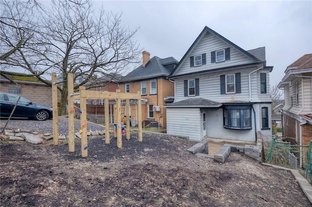 1223 Chelton Ave, Brookline, PA 15226 - rear view of property with fence and a playground