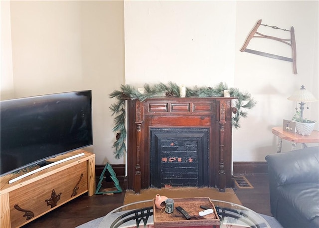living room with wood finished floors