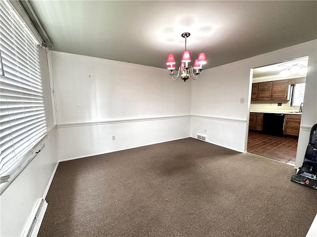 unfurnished dining area featuring dark carpet, visible vents, a baseboard heating unit, a sink, and a notable chandelier