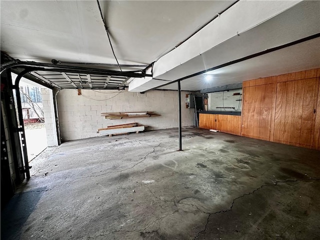 below grade area with concrete block wall