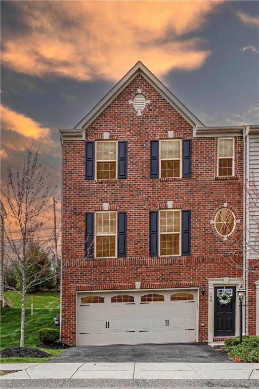 104 Noble Woods Dr, Moon/Crescent Twp, PA 15108 - view of front of home with a garage, driveway, and brick siding