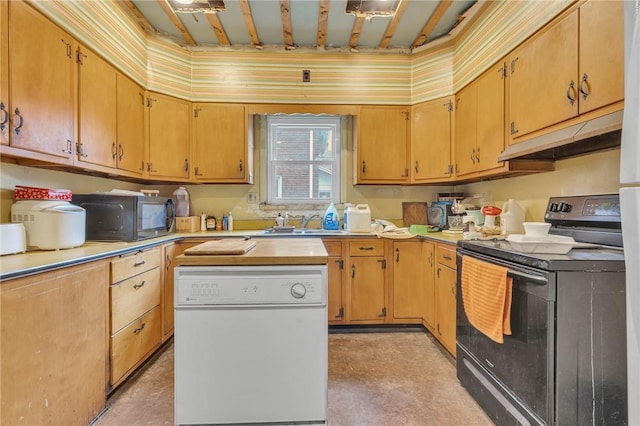 338 4th St, Beaver, PA 15009 - kitchen featuring light countertops, black appliances, a center island, and under cabinet range hood
