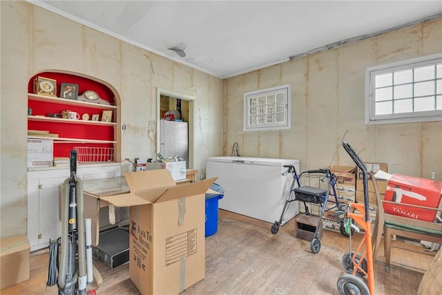 338 4th St, Beaver, PA 15009 - basement featuring freestanding refrigerator, fridge, and hardwood / wood-style flooring