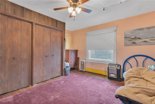 338 4th St, Beaver, PA 15009 - bedroom featuring multiple closets, a ceiling fan, and radiator