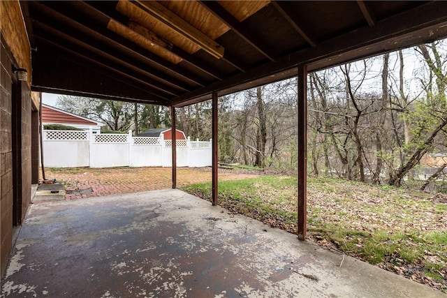 view of patio featuring fence