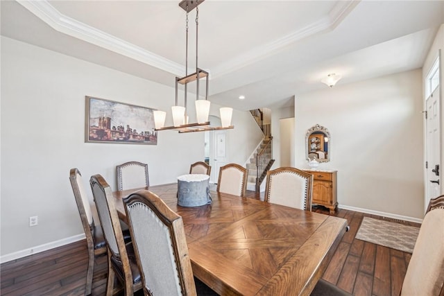 dining space with ornamental molding, baseboards, dark wood-style floors, and stairway