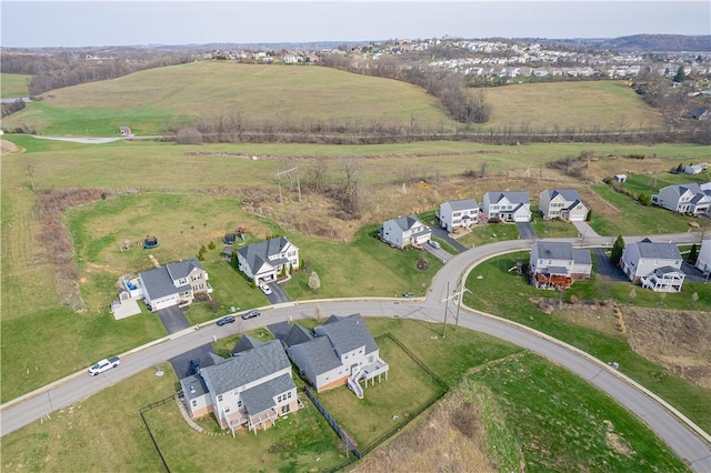 birds eye view of property featuring a rural view and a residential view