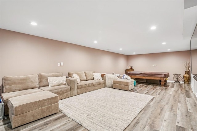 living room featuring light wood finished floors, pool table, baseboards, and recessed lighting