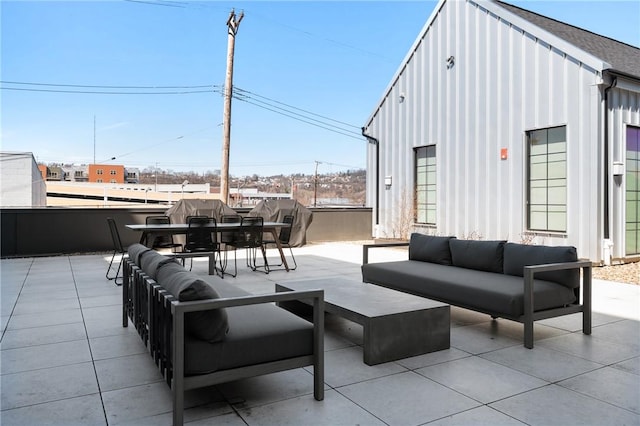 view of patio featuring an outdoor hangout area and outdoor dining area