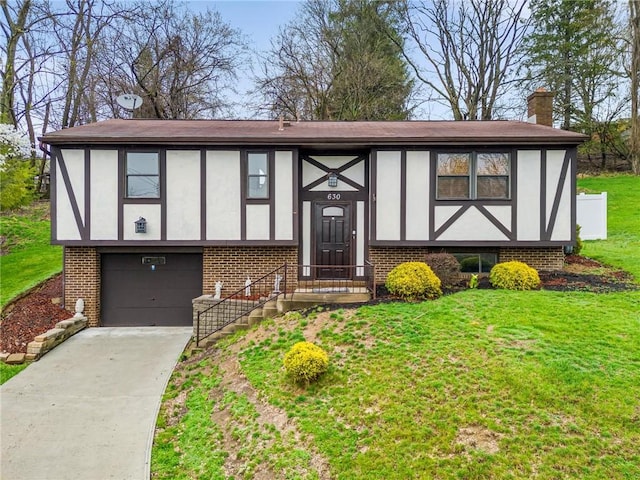 english style home with an attached garage, driveway, stucco siding, and a front lawn