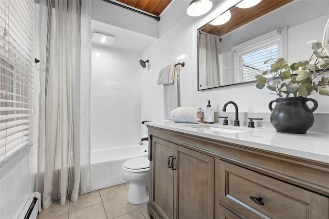 bathroom featuring vanity, a baseboard heating unit, tile patterned floors, shower / tub combo with curtain, and toilet