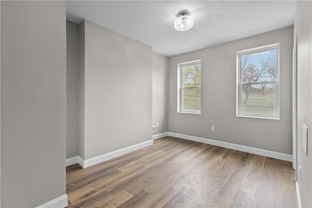 830 Adelaide St, Schenley Heights, PA 15219 - empty room featuring baseboards and wood finished floors