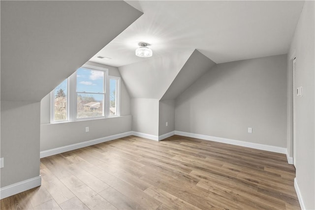 830 Adelaide St, Schenley Heights, PA 15219 - bonus room featuring visible vents, baseboards, and wood finished floors