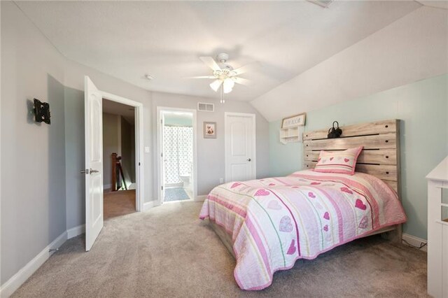 carpeted bedroom featuring baseboards, a ceiling fan, and visible vents