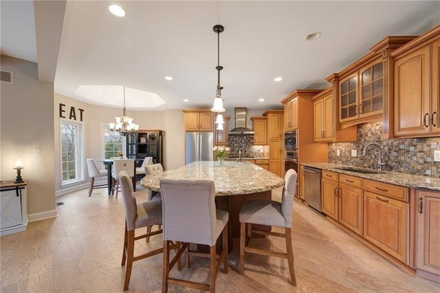dining area with baseboards, a chandelier, recessed lighting, light wood-style flooring, and visible vents