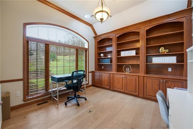 office area featuring visible vents, baseboards, vaulted ceiling, and light wood-style flooring