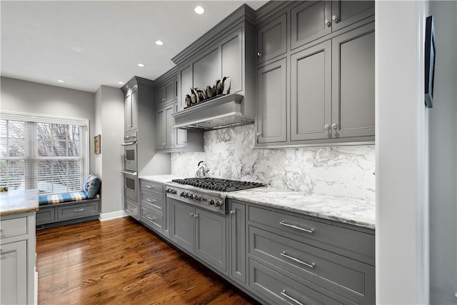 kitchen with stainless steel appliances, recessed lighting, and gray cabinets