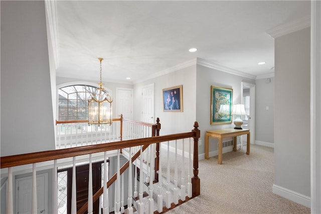 hall featuring baseboards, a chandelier, recessed lighting, an upstairs landing, and carpet