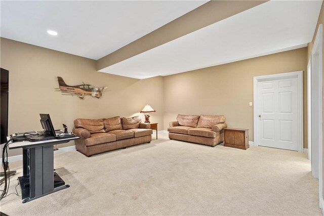 living area with recessed lighting, baseboards, and carpet floors