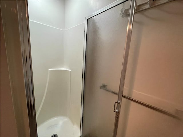 bathroom with a stall shower