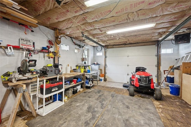 garage featuring concrete block wall