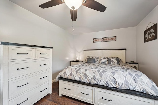 bedroom with dark wood-style floors, baseboards, and ceiling fan
