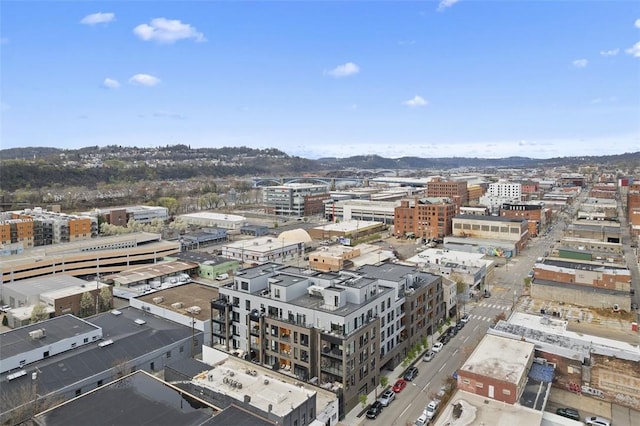 birds eye view of property with a view of city