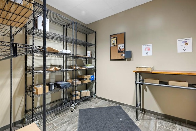interior space featuring baseboards