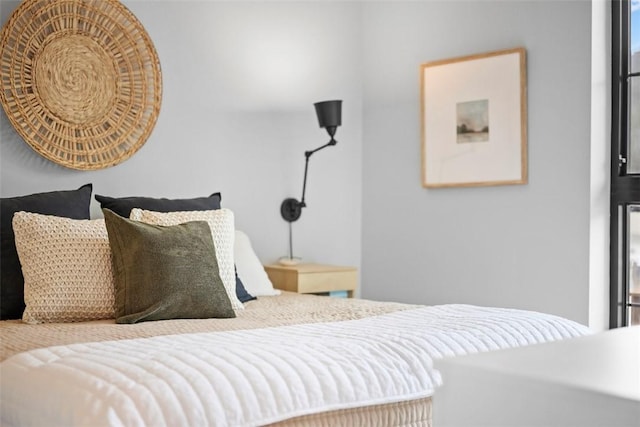 bedroom featuring multiple windows