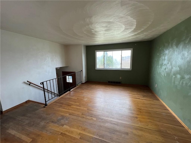 546 Center Hill Dr, Plum Boro, PA 15239 - empty room with visible vents, baseboards, and wood finished floors