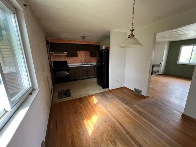 546 Center Hill Dr, Plum Boro, PA 15239 - interior space featuring light wood-type flooring, a sink, and visible vents