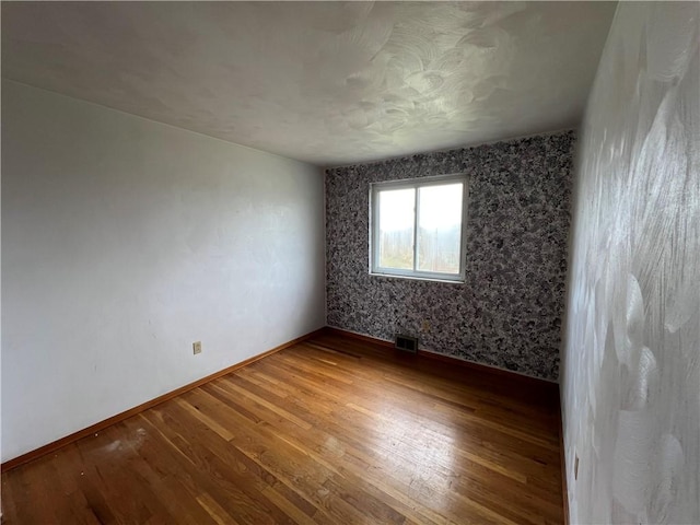 546 Center Hill Dr, Plum Boro, PA 15239 - empty room featuring wood finished floors, baseboards, and visible vents