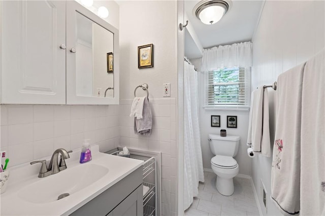 1171 Fox Terrier Dr, Bethel Park, PA 15102 - bathroom featuring visible vents, tile walls, toilet, vanity, and tile patterned flooring