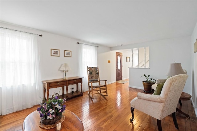 1171 Fox Terrier Dr, Bethel Park, PA 15102 - sitting room featuring light wood-type flooring, a healthy amount of sunlight, and baseboards