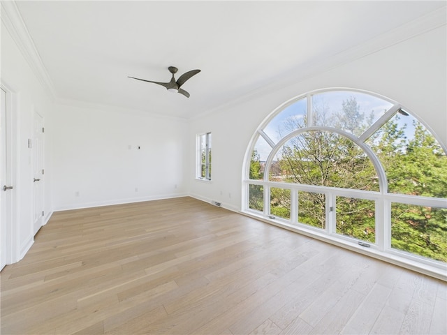 138 N Woodland Rd, Shadyside, PA 15232 - unfurnished living room featuring a ceiling fan, light wood-style flooring, ornamental molding, and baseboards
