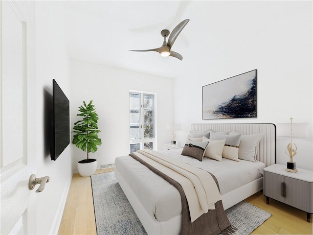 138 N Woodland Rd, Shadyside, PA 15232 - bedroom with light wood finished floors, ceiling fan, and baseboards