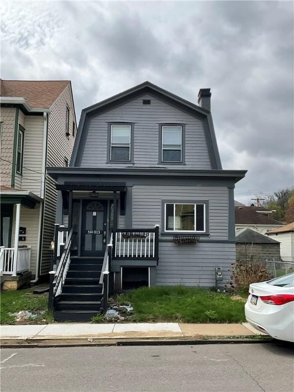 913 Russellwood Ave, Mckees Rocks, PA 15136 - dutch colonial with a gambrel roof and a chimney