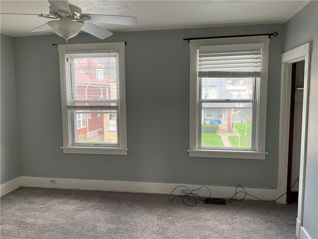 913 Russellwood Ave, Mckees Rocks, PA 15136 - carpeted spare room with baseboards and ceiling fan