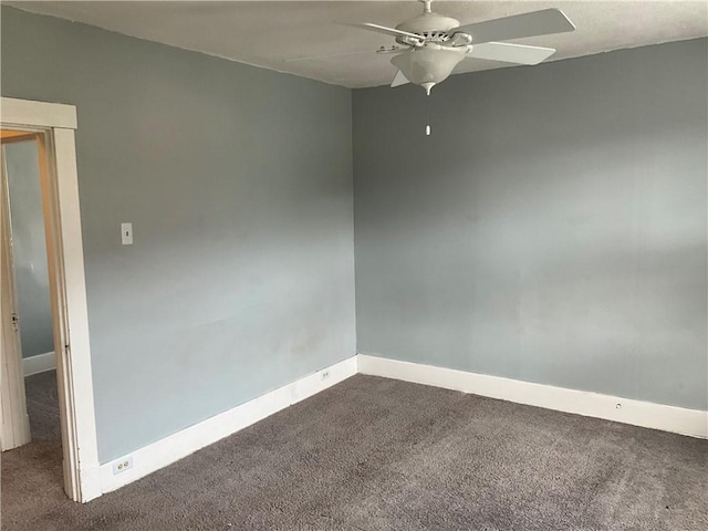 913 Russellwood Ave, Mckees Rocks, PA 15136 - spare room with dark colored carpet, baseboards, and ceiling fan
