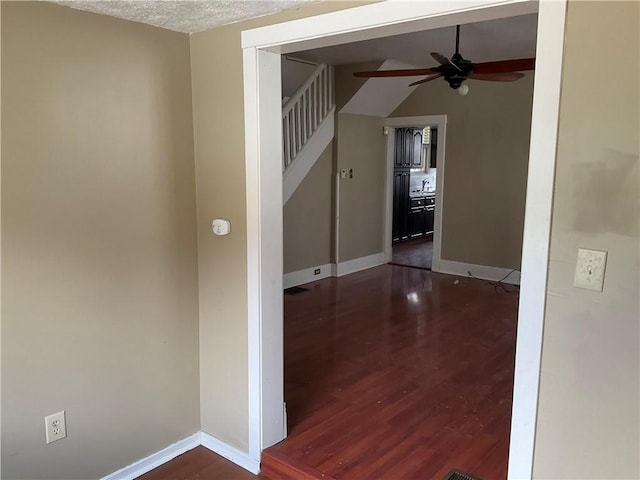 913 Russellwood Ave, Mckees Rocks, PA 15136 - interior space featuring dark wood-type flooring, baseboards, stairway, and a textured ceiling