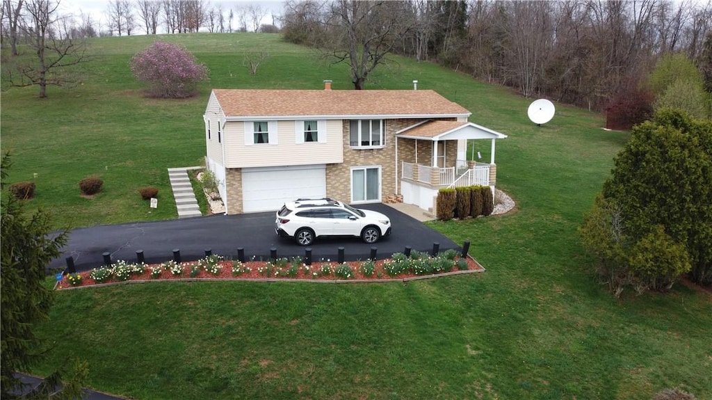 view of storm shelter with stairway and a lawn