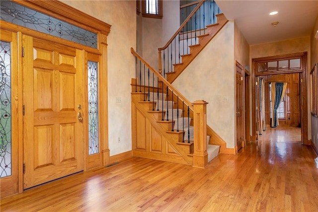 422 Heights Dr, Pine Twp Nal, PA 15044 - foyer with stairway, baseboards, and wood finished floors